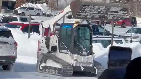 man in skid steer goes on rampage|'On a rampage': Video shows Nebraska man slam Bobcat into .